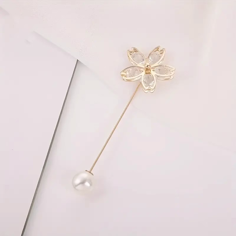 Personalized Brooch Pins Set of 1/4 personalized brooch pins in artificial crystal flower, butterfly, and daisy designs, perfect for sweaters, shawls, coats, and suits.