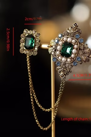 Vintage brooch with rhinestone chain and elegant design, made of zinc alloy. Let me know if you'd like further refinements!