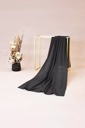 Lightweight charcoal chiffon hijab with a smooth and elegant drape, ideal for formal and casual wear.