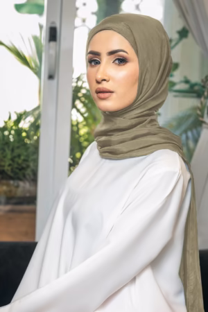Elegant olive silk hijab with a luxurious, smooth finish, perfect for casual, formal, and everyday wear