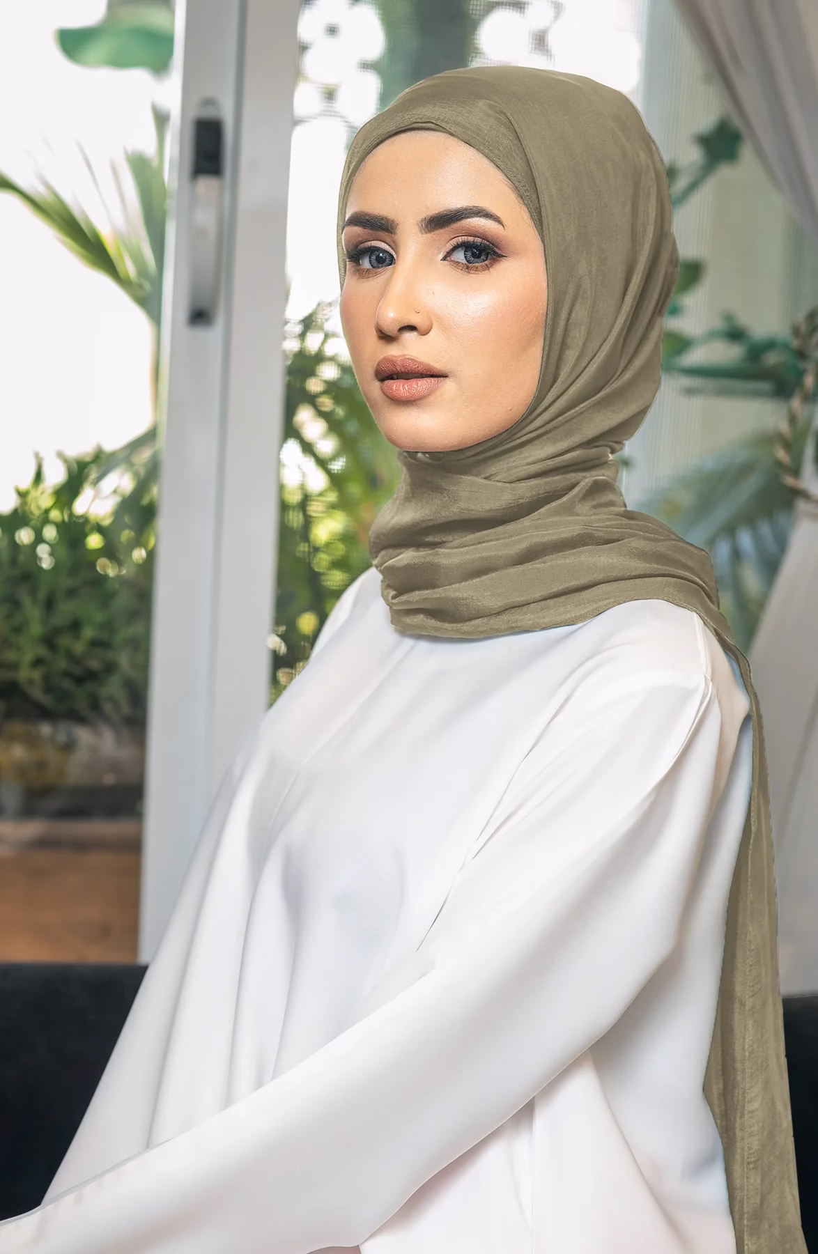 Olive Silk Hijab – Chic and Elegant Headscarf for Women Elegant olive silk hijab with a luxurious, smooth finish, perfect for casual, formal, and everyday wear