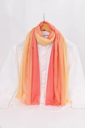 Shimmery Ombre Hijab in Peach & Yellow, lightweight and breathable with a stunning gradient design.