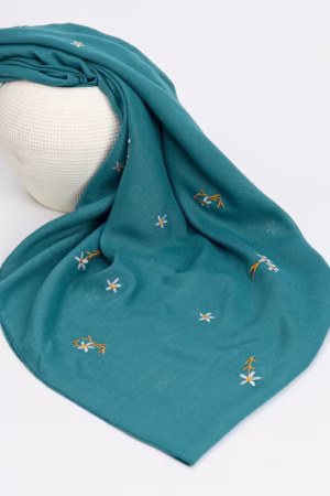 Teal Bloom Stitch Lawn Hijab with lightweight, breathable fabric and delicate embroidery for an elegant look.