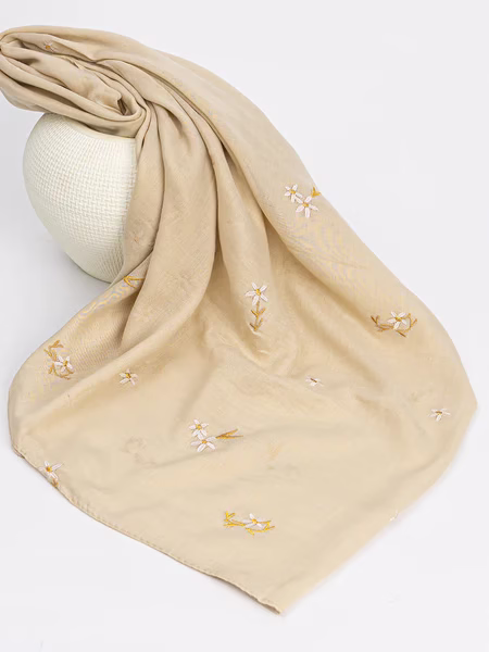 Bloom Stitch Embroidered Lawn Hijab – Beige, Lightweight and Elegant Bloom Stitch Embroidered Lawn Hijab in Beige, lightweight and breathable with an elegant embroidered design.