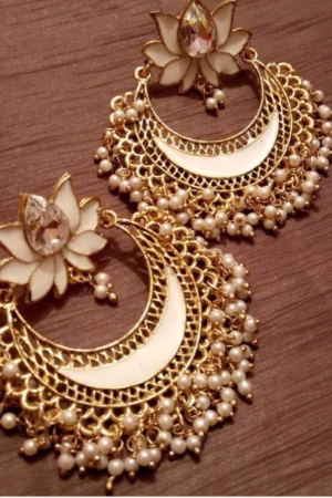 Elegant golden crescent earrings adorned with pearls and floral accents, perfect for traditional and festive occasions.