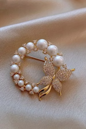 Vintage French Inspired Butterfly Hijab Pin with freshwater pearls and rhinestones, perfect for casual and formal hijab styles.