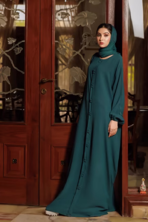 A Green Fancy Button Abaya displayed on a mannequin, highlighting its elegant tailoring and ornate button details.
